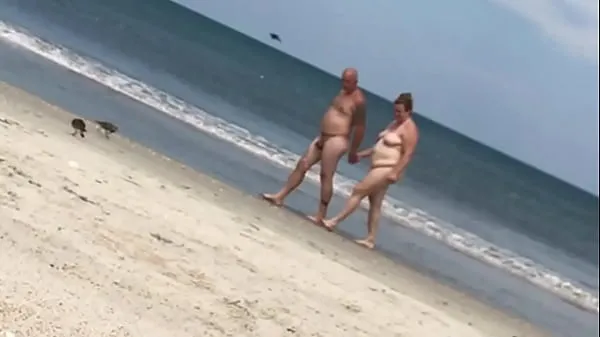 Watch ladies at a nude beach enjoying what they see total Tube