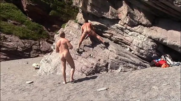 Watch kinky photos being taken on a nudist beach total Tube